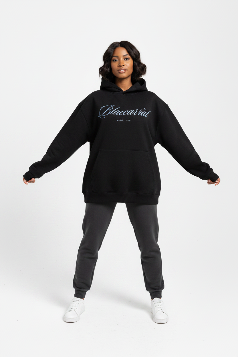 Female model loosened pose — Essential Heavyweight Hoodie